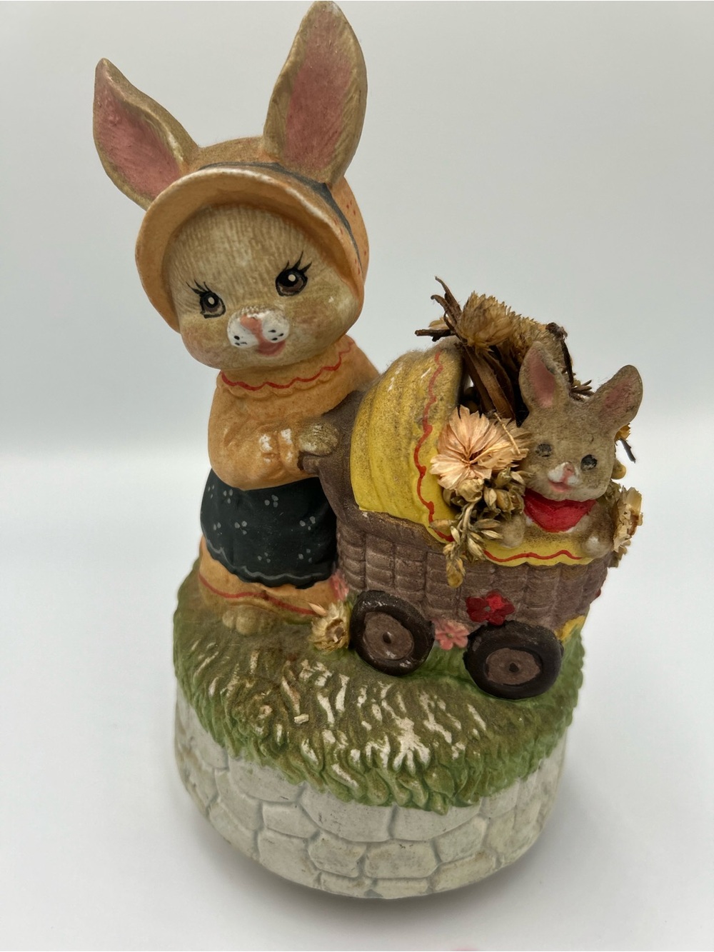 Vintage Bunny Figurine with Cart and Flowers Music Wind Up. It’s a small world